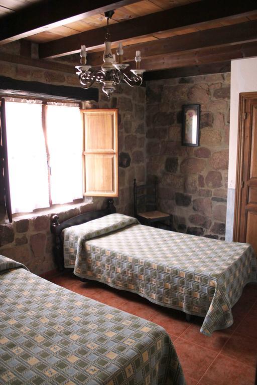 Maison d'hôtes Casa Entrenidos à Mudá Chambre photo