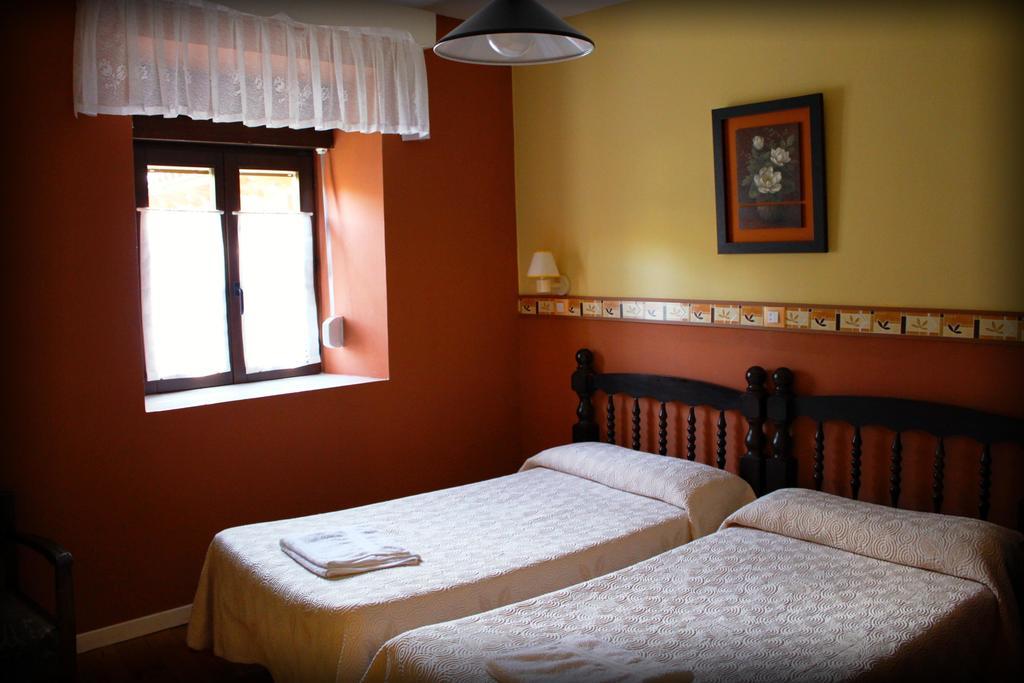 Maison d'hôtes Casa Entrenidos à Mudá Chambre photo