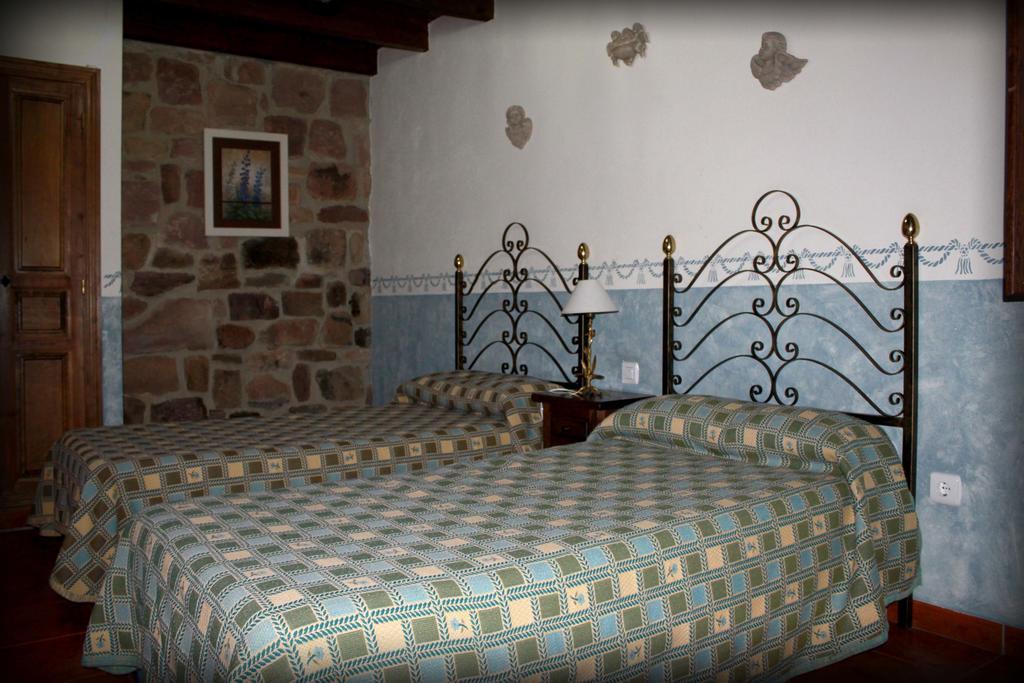 Maison d'hôtes Casa Entrenidos à Mudá Chambre photo