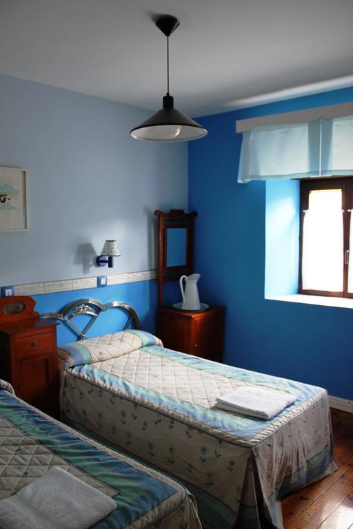 Maison d'hôtes Casa Entrenidos à Mudá Chambre photo